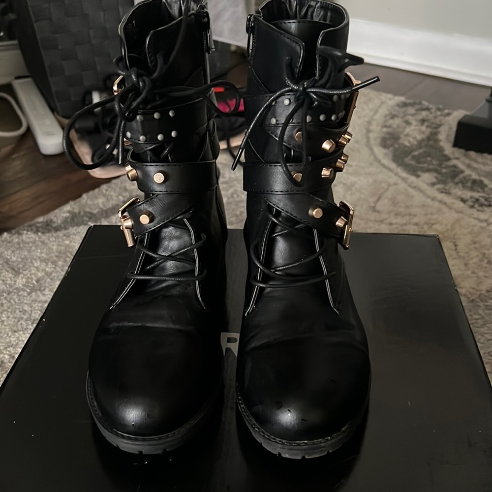 Torrid belted combated boots